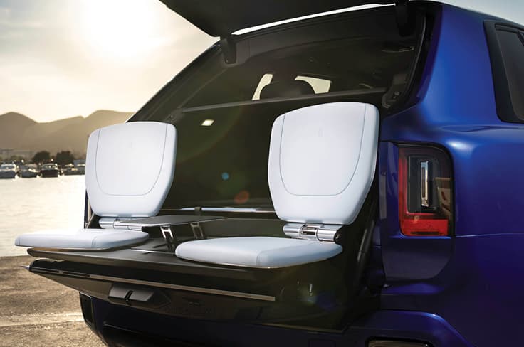 rolls royce cullinan black badge viewing suite seats rolls royce cullinan black badge in field